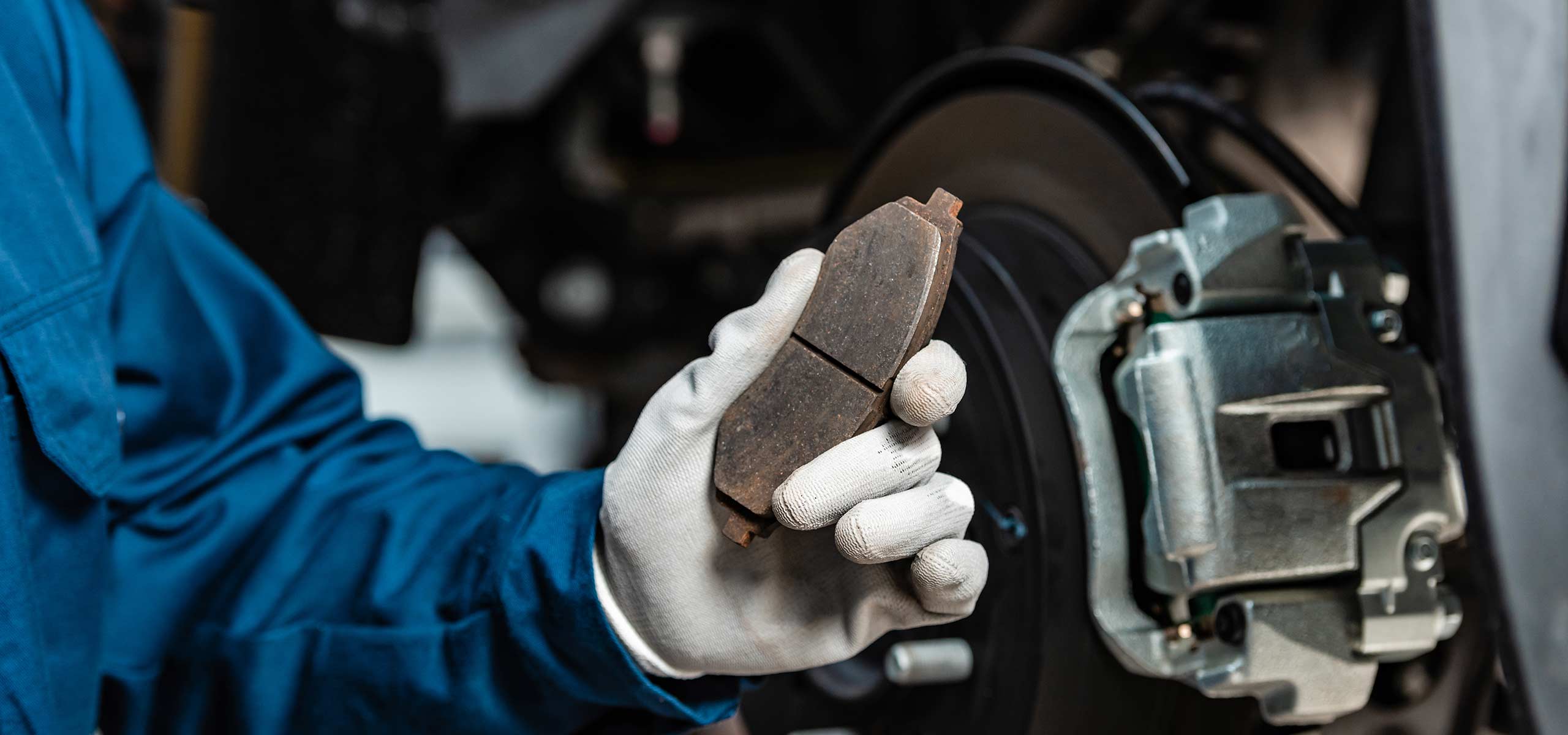 brake pads being replaced